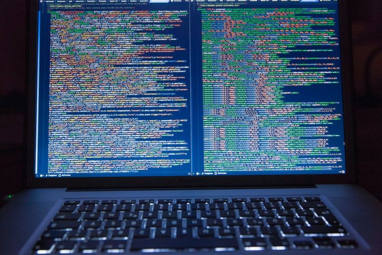 Code editor open with wp-config.php file showing WP_DEBUG constant in WordPress