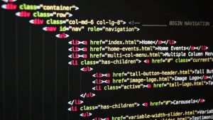 Binary code on a dark screen representing automated bot attacks on WordPress