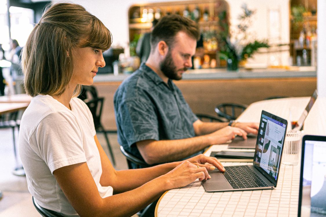 Person working on a laptop configuring WordPress security settings