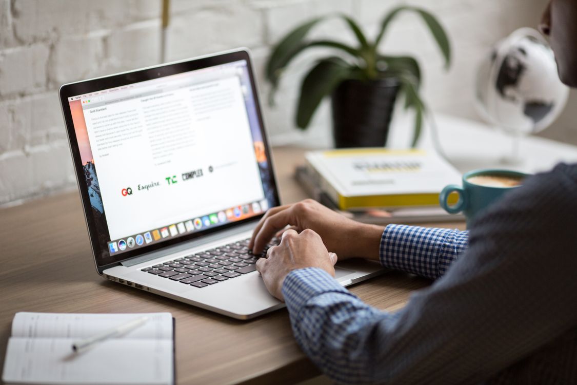 Person securely accessing WordPress admin from a trusted location using IP whitelist