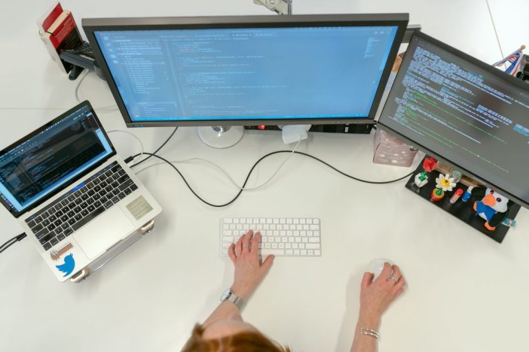 Developer enabling WordPress debugging mode on a laptop